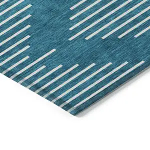Photo of Teal Blue And Ivory Geometric Washable Indoor Outdoor Area Rug