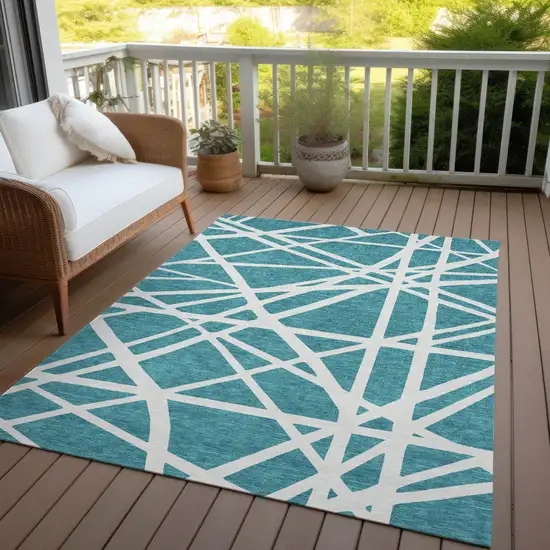 Teal Blue And Ivory Geometric Washable Indoor Outdoor Area Rug Photo 6