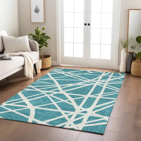 Teal Blue And Ivory Geometric Washable Indoor Outdoor Area Rug Photo 9