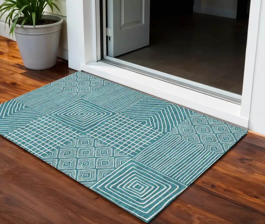 Teal Blue And Ivory Geometric Washable Indoor Outdoor Area Rug Photo 1