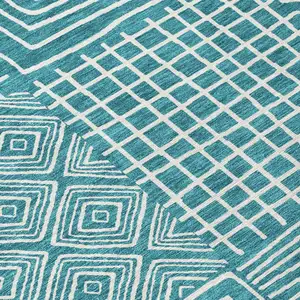 Photo of Teal Blue And Ivory Geometric Washable Indoor Outdoor Area Rug