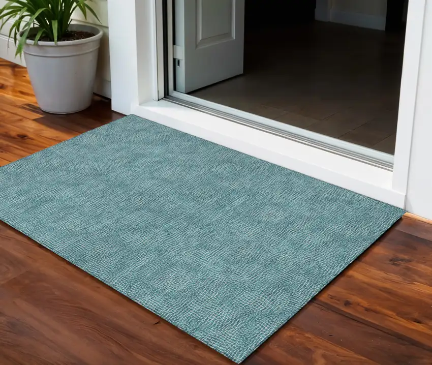 Teal Blue And Ivory Geometric Washable Indoor Outdoor Area Rug Photo 1