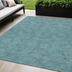 Photo of Teal Blue And Ivory Geometric Washable Indoor Outdoor Area Rug