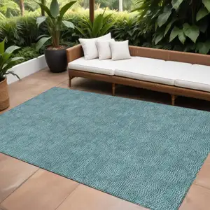 Photo of Teal Blue And Ivory Geometric Washable Indoor Outdoor Area Rug