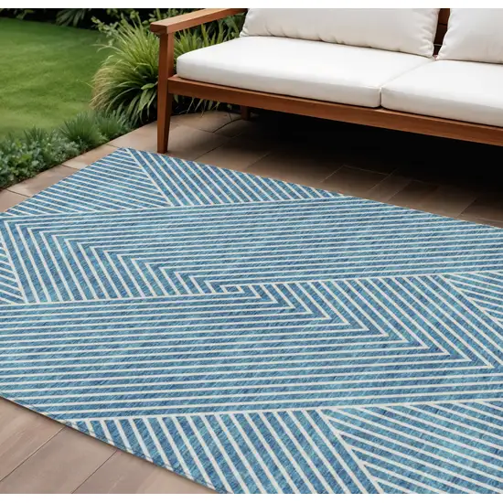 Teal Blue And Ivory Geometric Washable Indoor Outdoor Area Rug Photo 1