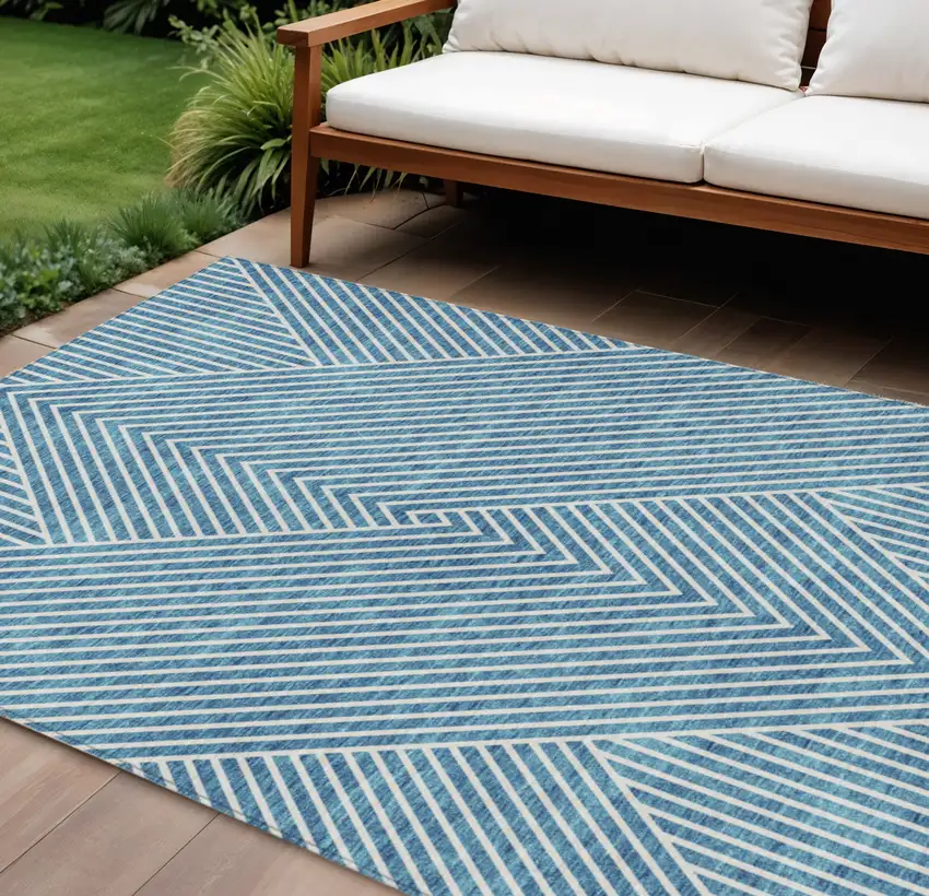 Teal Blue And Ivory Geometric Washable Indoor Outdoor Area Rug Photo 1