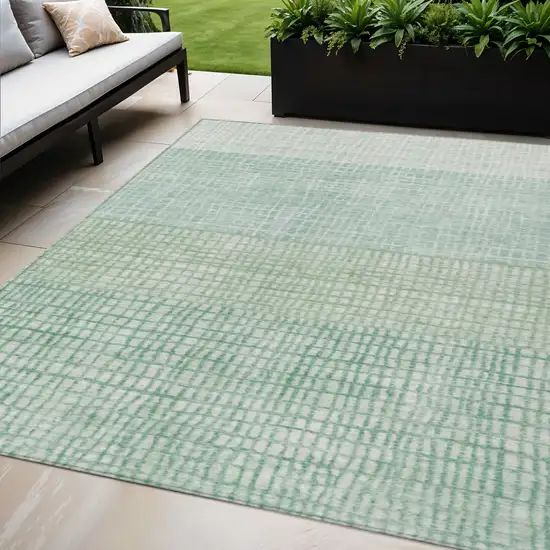 Teal Blue And Ivory Geometric Washable Indoor Outdoor Area Rug Photo 2