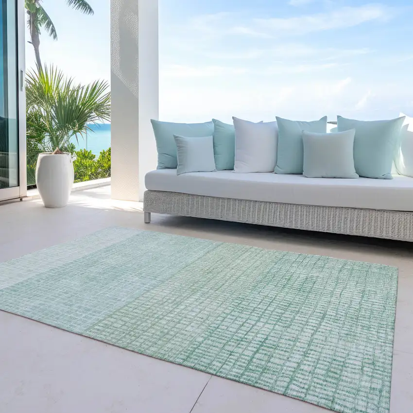 Teal Blue And Ivory Geometric Washable Indoor Outdoor Area Rug Photo 5