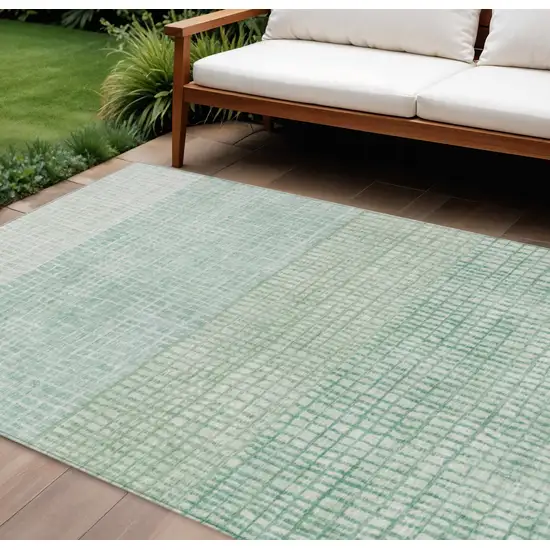 Teal Blue And Ivory Geometric Washable Indoor Outdoor Area Rug Photo 2