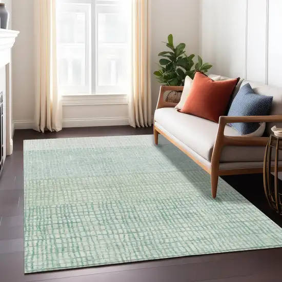 Teal Blue And Ivory Geometric Washable Indoor Outdoor Area Rug Photo 7