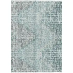 Photo of Teal Blue And Ivory Geometric Washable Indoor Outdoor Area Rug