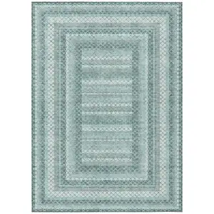 Photo of Teal Blue And Ivory Geometric Washable Indoor Outdoor Area Rug