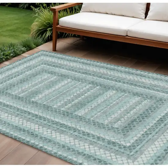Teal Blue And Ivory Geometric Washable Indoor Outdoor Area Rug Photo 2