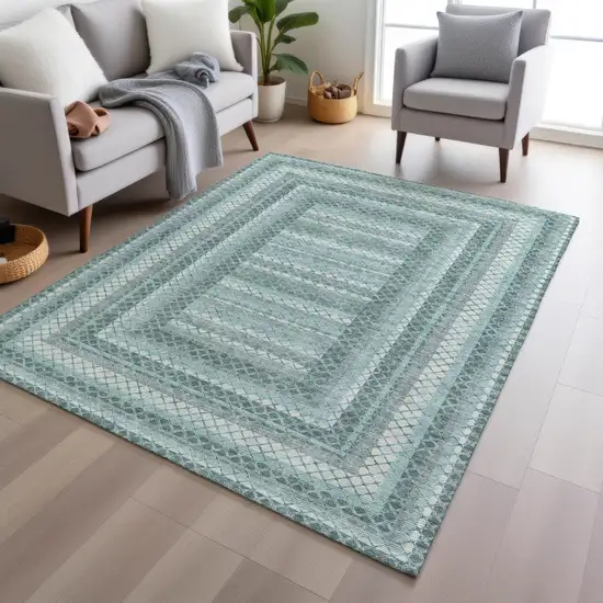 Teal Blue And Ivory Geometric Washable Indoor Outdoor Area Rug Photo 6