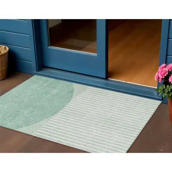 Teal Blue And Ivory Geometric Washable Indoor Outdoor Area Rug Photo 2
