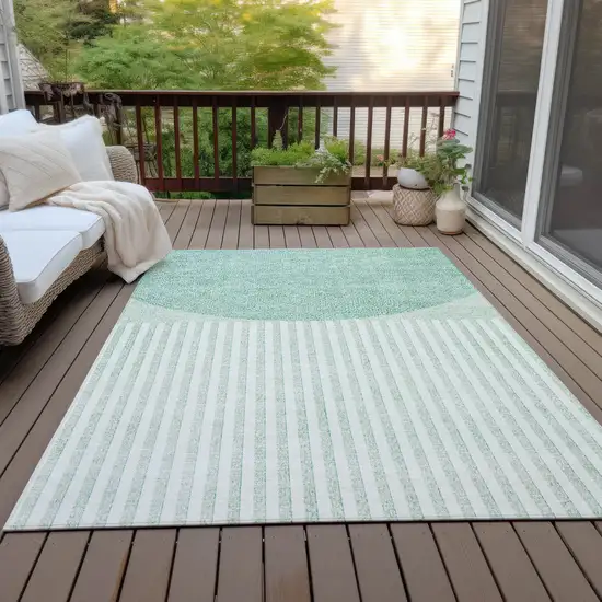 Teal Blue And Ivory Geometric Washable Indoor Outdoor Area Rug Photo 6