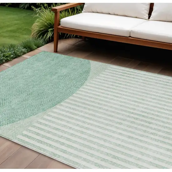 Teal Blue And Ivory Geometric Washable Indoor Outdoor Area Rug Photo 2