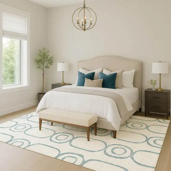 Teal Blue And Ivory Geometric Washable Indoor Outdoor Area Rug Photo 7