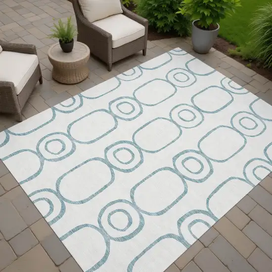 Teal Blue And Ivory Geometric Washable Indoor Outdoor Area Rug Photo 6