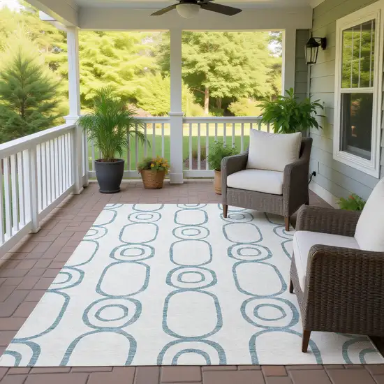 Teal Blue And Ivory Geometric Washable Indoor Outdoor Area Rug Photo 9