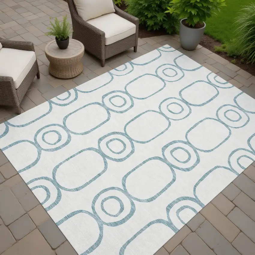 Teal Blue And Ivory Geometric Washable Indoor Outdoor Area Rug Photo 6