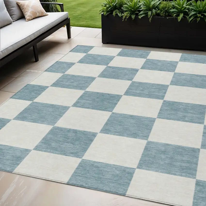 Teal Blue And Ivory Geometric Washable Indoor Outdoor Area Rug Photo 1