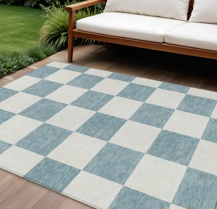 Teal Blue And Ivory Geometric Washable Indoor Outdoor Area Rug Photo 1