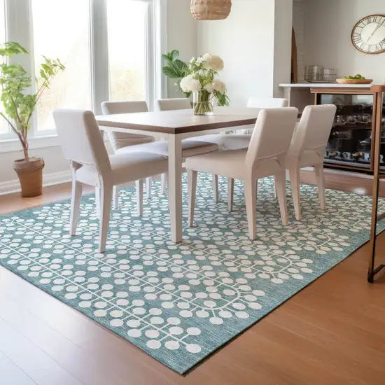 Teal Blue And Ivory Geometric Washable Indoor Outdoor Area Rug Photo 9