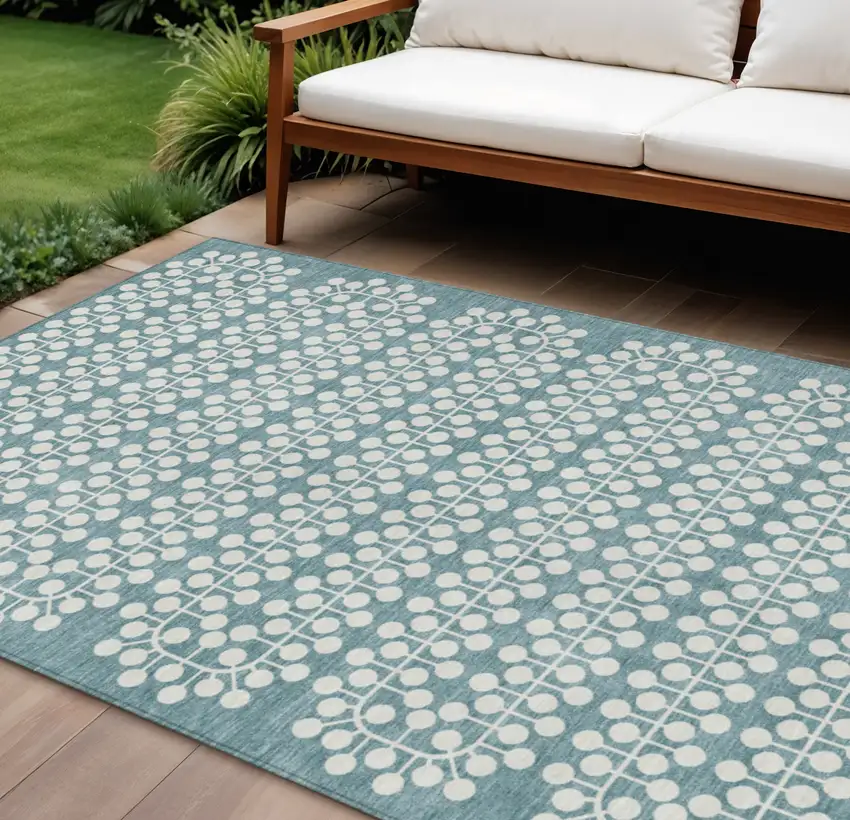 Teal Blue And Ivory Geometric Washable Indoor Outdoor Area Rug Photo 1