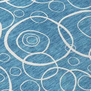 Photo of Teal Blue And Ivory Geometric Washable Indoor Outdoor Area Rug