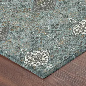 Photo of Teal Blue And Ivory Geometric Washable Indoor Outdoor Area Rug