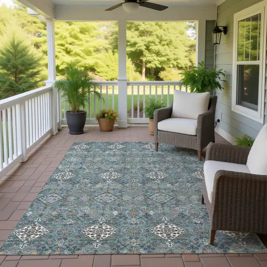 Teal Blue And Ivory Geometric Washable Indoor Outdoor Area Rug Photo 4