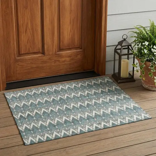 Teal Blue And Ivory Geometric Washable Indoor Outdoor Area Rug Photo 1