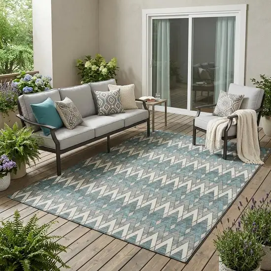 Teal Blue And Ivory Geometric Washable Indoor Outdoor Area Rug Photo 1