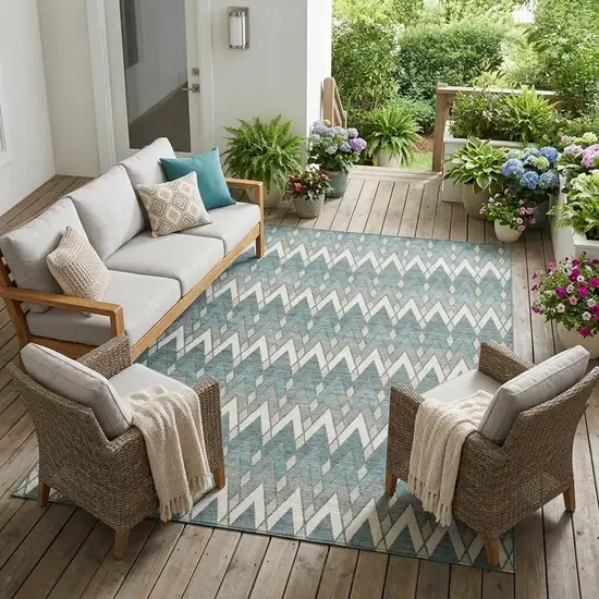 Teal Blue And Ivory Geometric Washable Indoor Outdoor Area Rug Photo 1