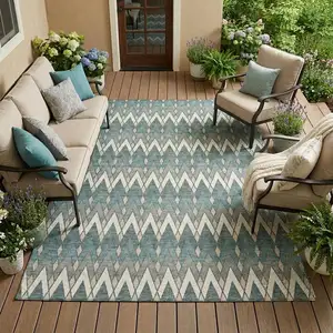 Photo of Teal Blue And Ivory Geometric Washable Indoor Outdoor Area Rug
