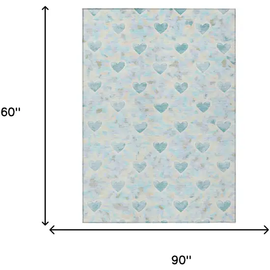 Teal Blue And Ivory Geometric Washable Indoor Outdoor Area Rug Photo 6