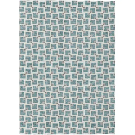 Teal Blue And Ivory Geometric Washable Indoor Outdoor Area Rug Photo 1