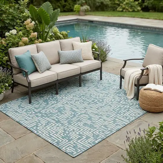 Teal Blue And Ivory Geometric Washable Indoor Outdoor Area Rug Photo 1