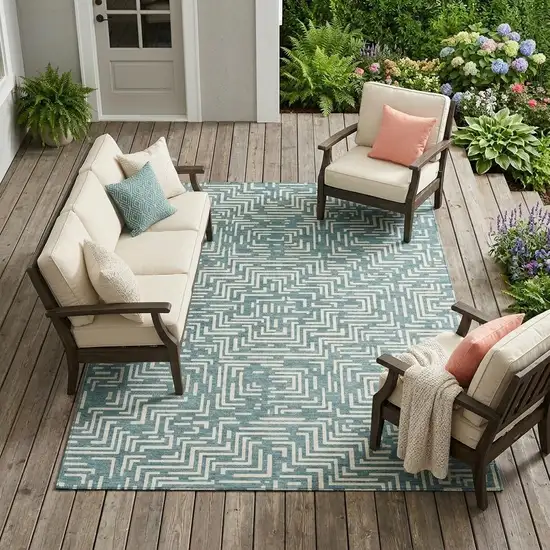 Teal Blue And Ivory Geometric Washable Indoor Outdoor Area Rug Photo 1