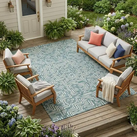 Teal Blue And Ivory Geometric Washable Indoor Outdoor Area Rug Photo 1