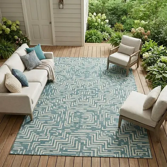 Teal Blue And Ivory Geometric Washable Indoor Outdoor Area Rug Photo 1