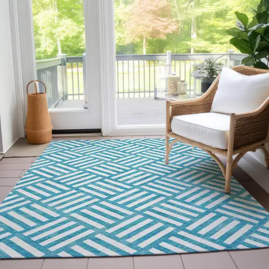 Teal Blue And Ivory Geometric Washable Indoor Outdoor Area Rug Photo 9
