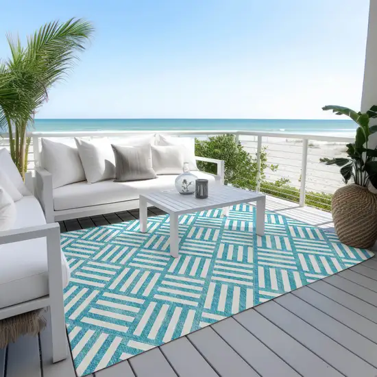 Teal Blue And Ivory Geometric Washable Indoor Outdoor Area Rug Photo 9