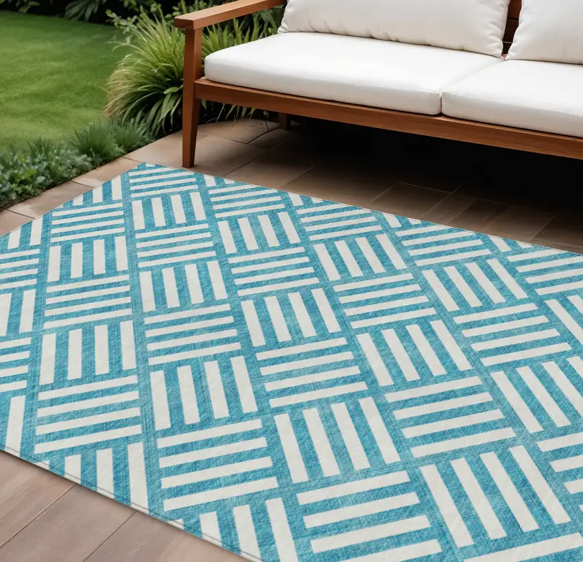 Teal Blue And Ivory Geometric Washable Indoor Outdoor Area Rug Photo 1
