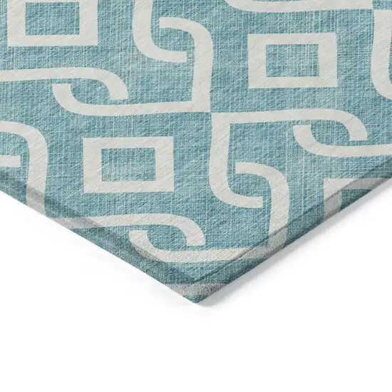Teal Blue And Ivory Geometric Washable Indoor Outdoor Area Rug Photo 5