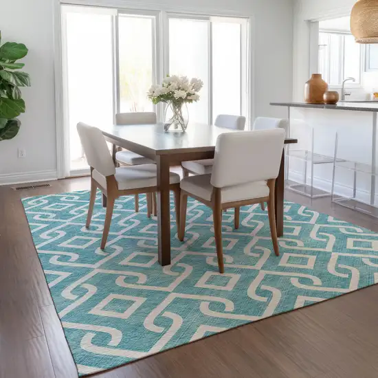 Teal Blue And Ivory Geometric Washable Indoor Outdoor Area Rug Photo 9