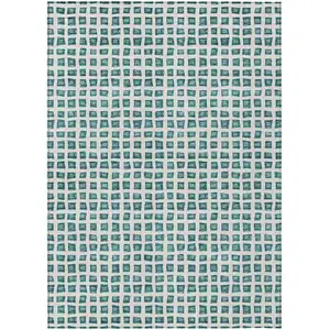 Photo of Teal Blue And Ivory Geometric Washable Indoor Outdoor Area Rug