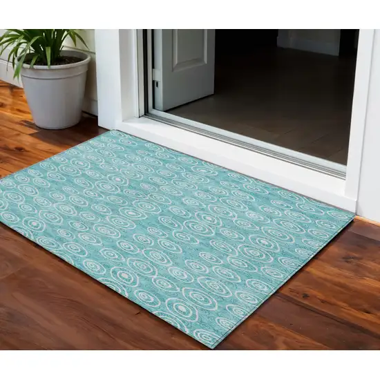 Teal Blue And Ivory Geometric Washable Indoor Outdoor Area Rug Photo 1