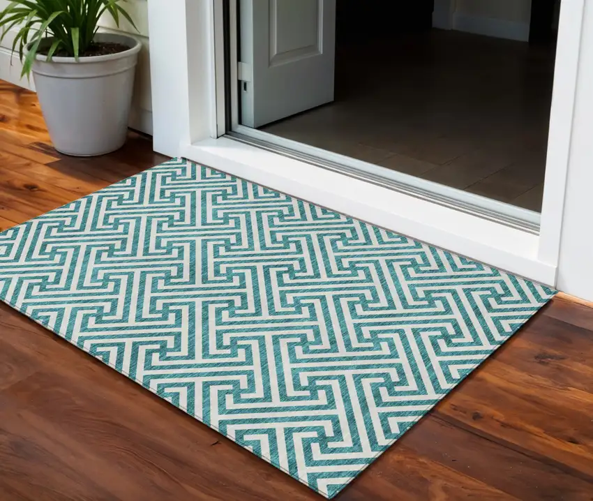 Teal Blue And Ivory Geometric Washable Indoor Outdoor Area Rug Photo 1